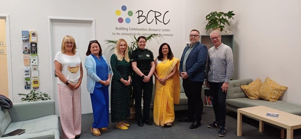 Members of the Building Communities Resource Centre, including members from the Ethnic Communities programme meet with the Society's CEO, Duane Farrell.
